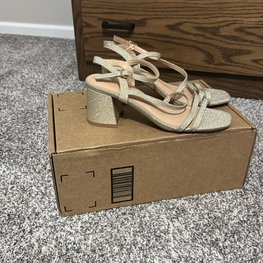 Sold—Gold Heels